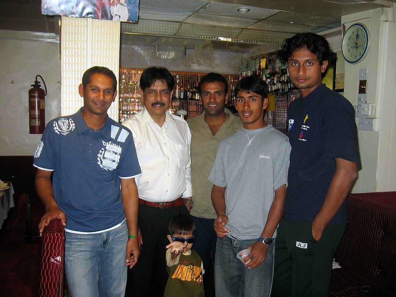 Sabbir Hossain with the Bangladesh cricket captain and other national team players in the older Balti House dining room