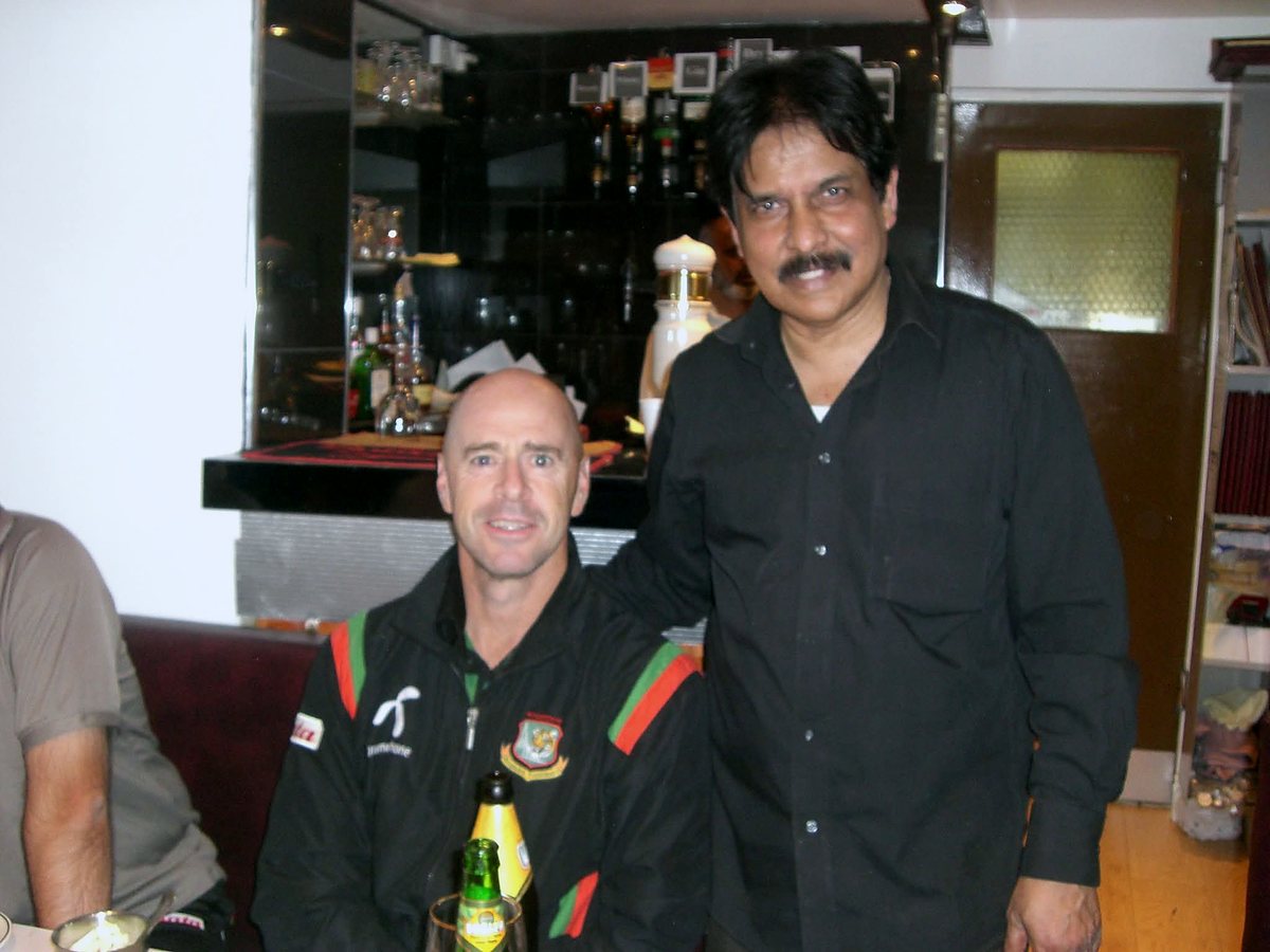 Bangladesh head coach Jamie Siddons in team tracksuit with Sabbir Hossain at The Balti House